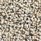 Close-up of cover crop black-eyed cowpeas with a focus on their texture and color.